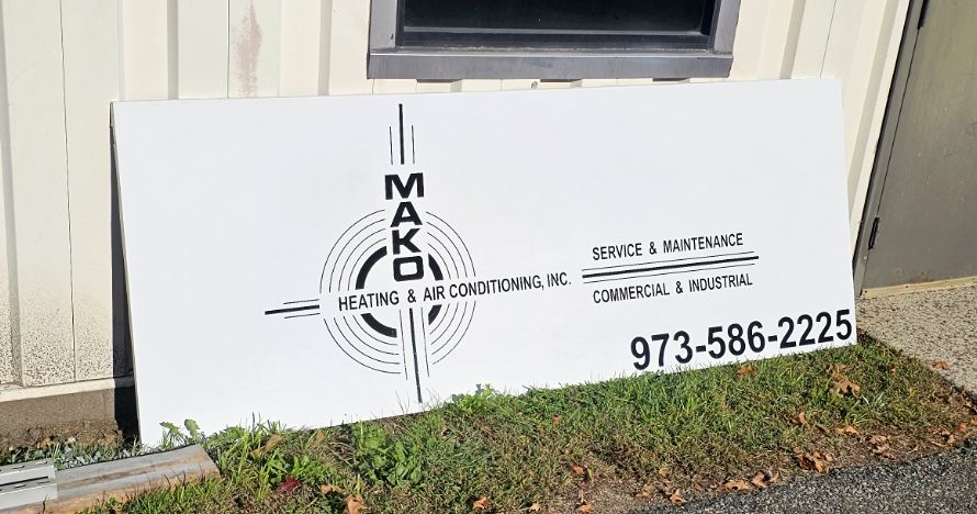 Mako Heating & Air Conditioning shop sign with logo, services and phone number, Denville NJ
